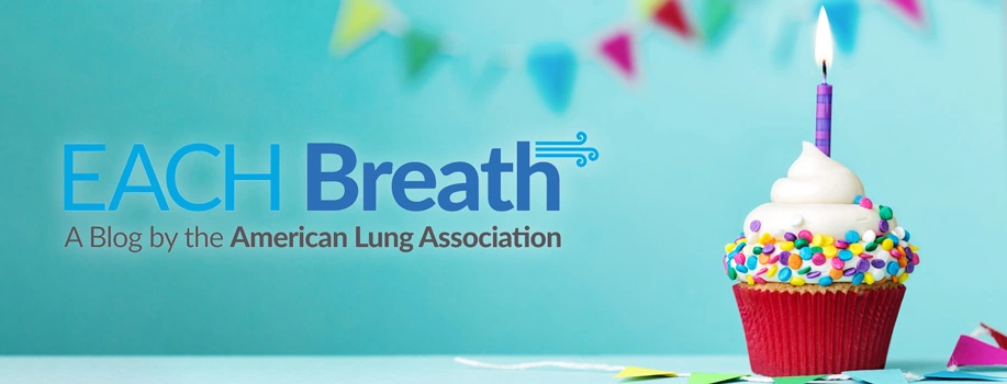 EACH Breath text next to a cupcake with lit purple candle